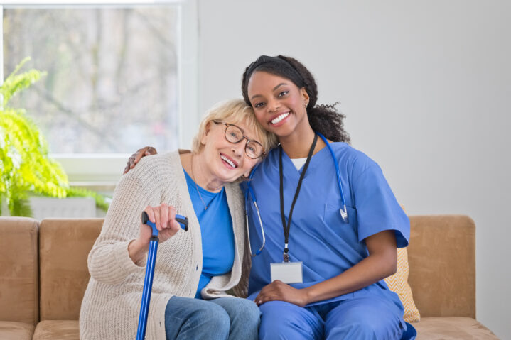 Portrait of nurse and senior woman